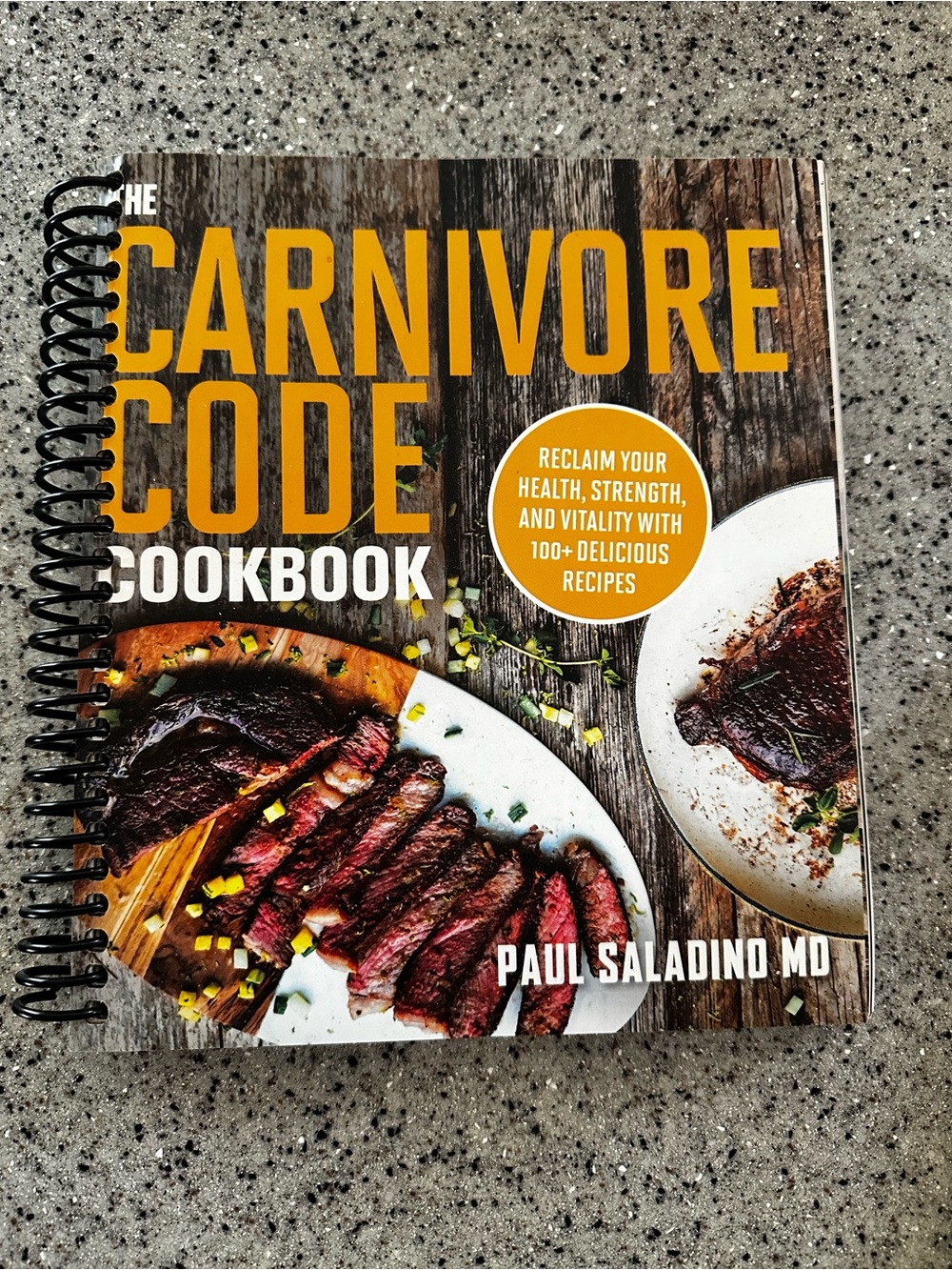 The Carnivore Code Cookbook by Paul Saladino MD - Yellow & Brown Cover
